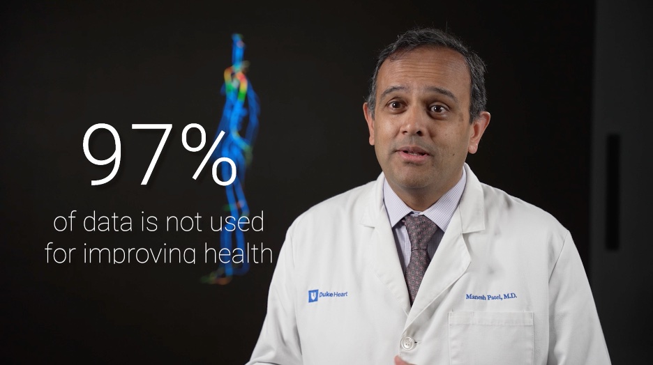 A physician interviewed on camera beside an on-screen statistic: 97% of data is not used for improving health